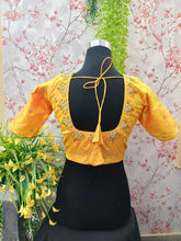 Yellow blouse with embroidery