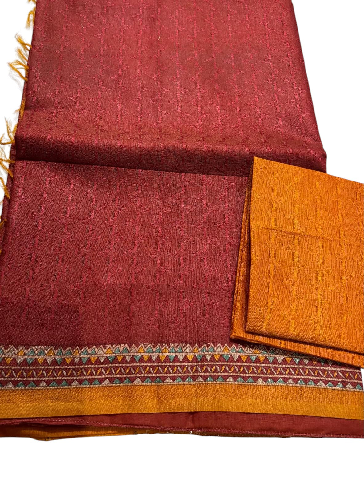 Brick red Ghicha Tussar Saree with Pumpkin Orange Blouse