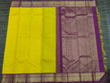 Bright Yellow Kanjivaram Saree with Wine Border