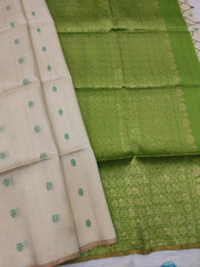 Cream Raw Silk Saree With Parrot Green Pallu - MIRASILKS Cream Raw Silk Saree With Parrot Green Pallu