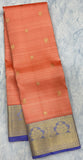Coral Pink Kanjivaram Saree with Lavender Purple and Golden Zari Border