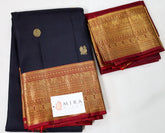 Jet Black Kanjivaram Silk Saree with Red border & Pallu
