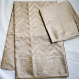 Beige Semi Banaras saree with silver design border