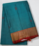 Peacock Green Kanjivaram Saree with Red and golden Zari Border
