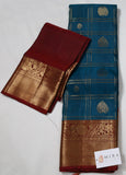 Peacock blue Kanjivaram Saree with Maroon Silver Zari Border