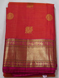 Orange Kanjivaram Saree with Pink and golden Zari Border