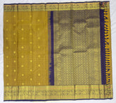 Mustard Kanjivaram Saree with Dark Violet Pallu & Peacock Border