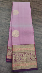 Lotus pink Kanjivaram Saree with Purple Border