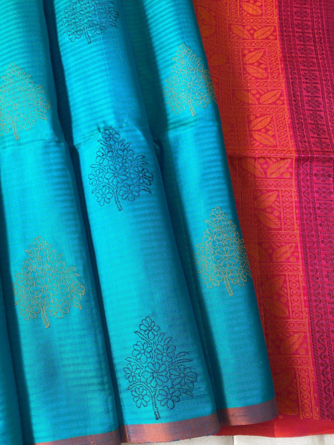 Aqua Blue Soft Silk Saree With Green and Black Floral Print and Orange Pallu - MIRASILKS Aqua Blue Soft Silk Saree With Green and Black Floral Print and Orange Pallu