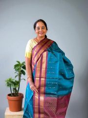 Persian Blue Kanjivaram Saree with Grape Border