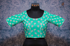 Green Blouse with White Floral Design