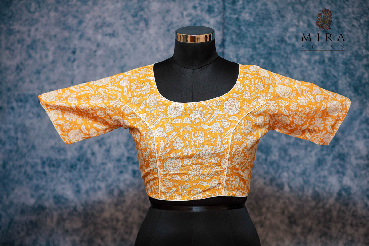 Yellow Blouse with White Floral Design