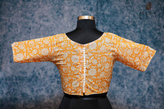 Yellow Blouse with White Floral Design