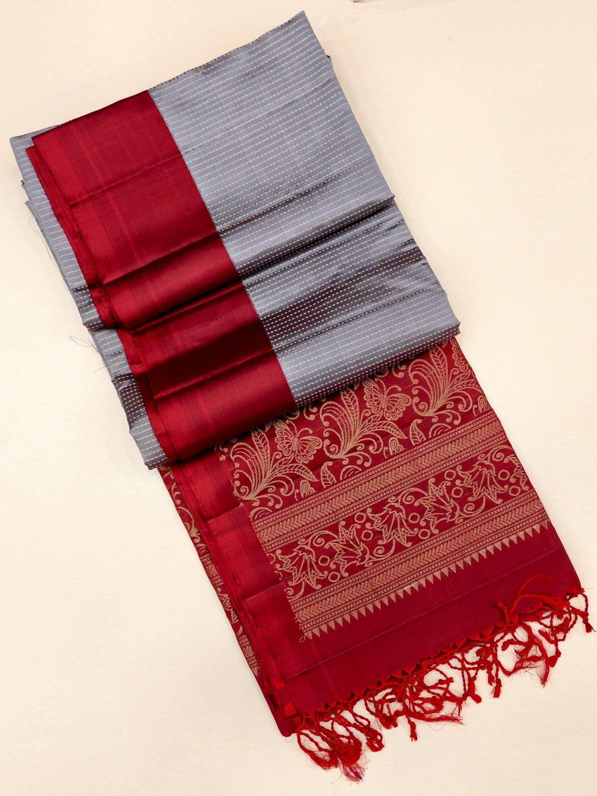 Grey color Soft Silk Saree with maroon border and pallu