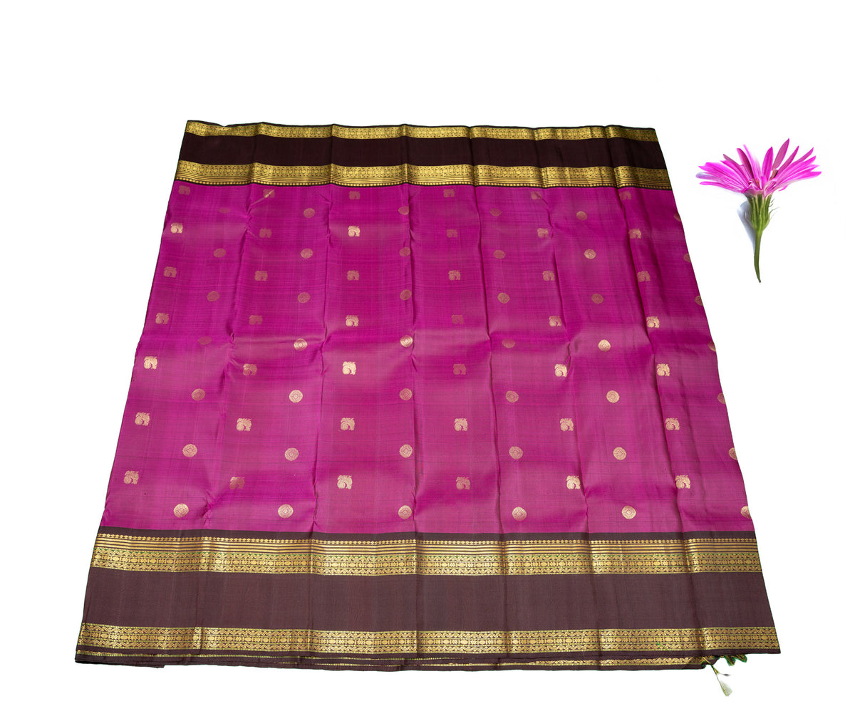 Magenta color Kanjivaram Saree with coffee brown Pallu and Border