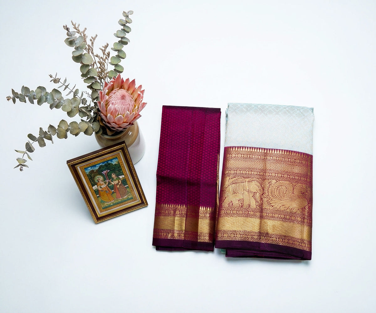 Off White Kanjivaram Saree with Maroon Border