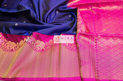 Navy blue soft silk saree with elephant motif on pink pallu