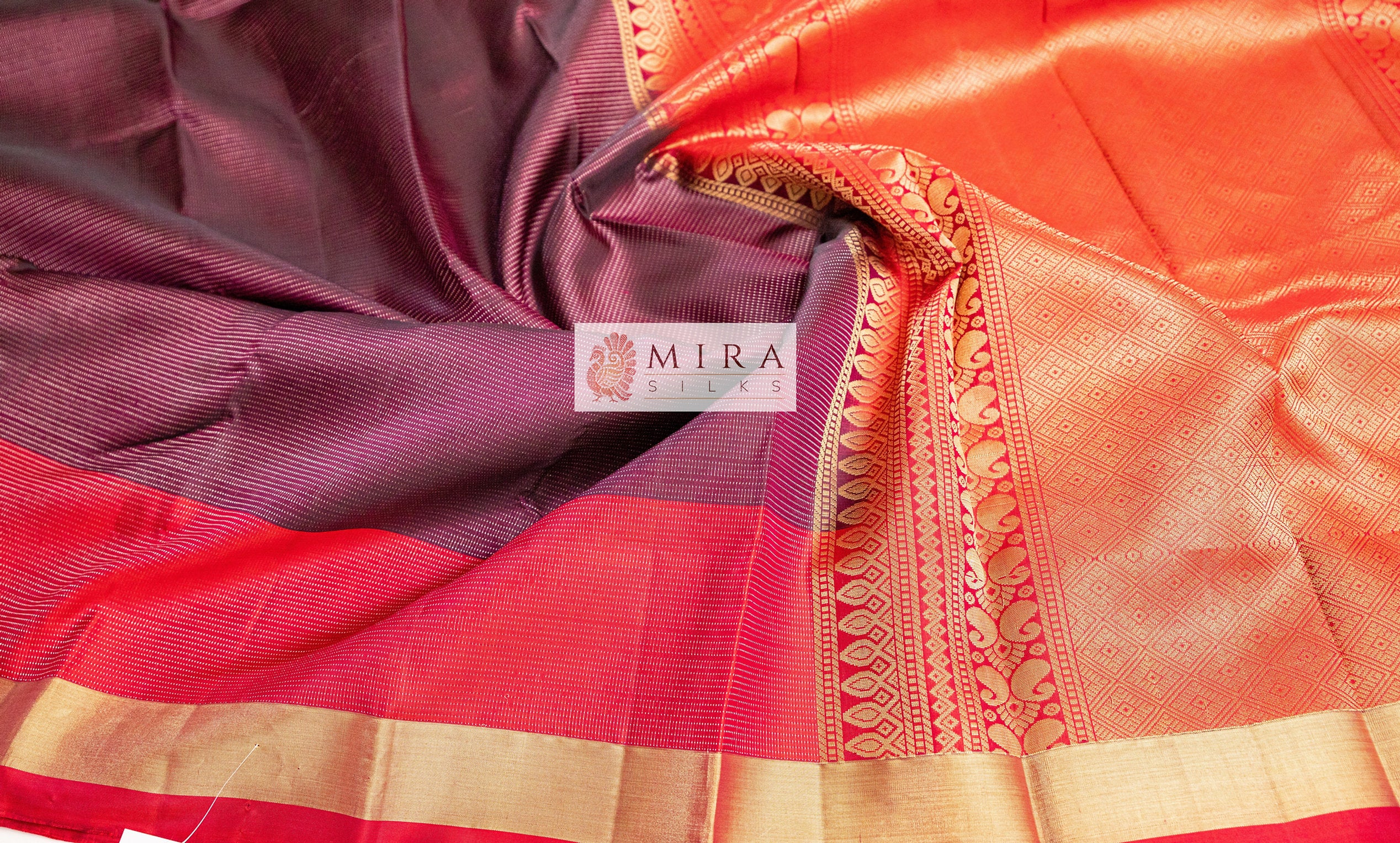 Brown vairaoosi saree with red pallu