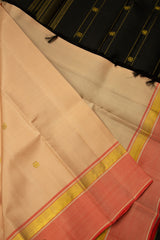 Beige Kanjivaram Saree with Orange & Black Border