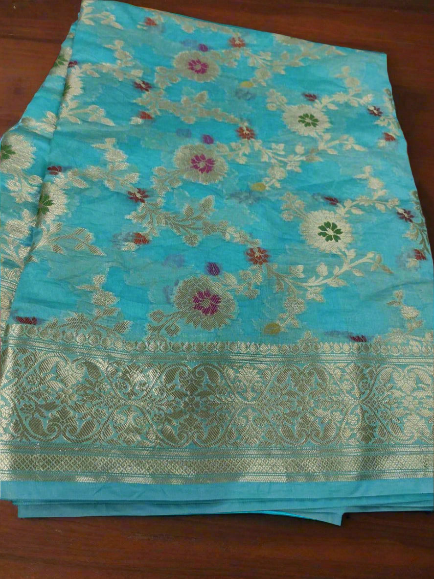 Bluish Cyan Banarasi Jaal Saree with Silver Border