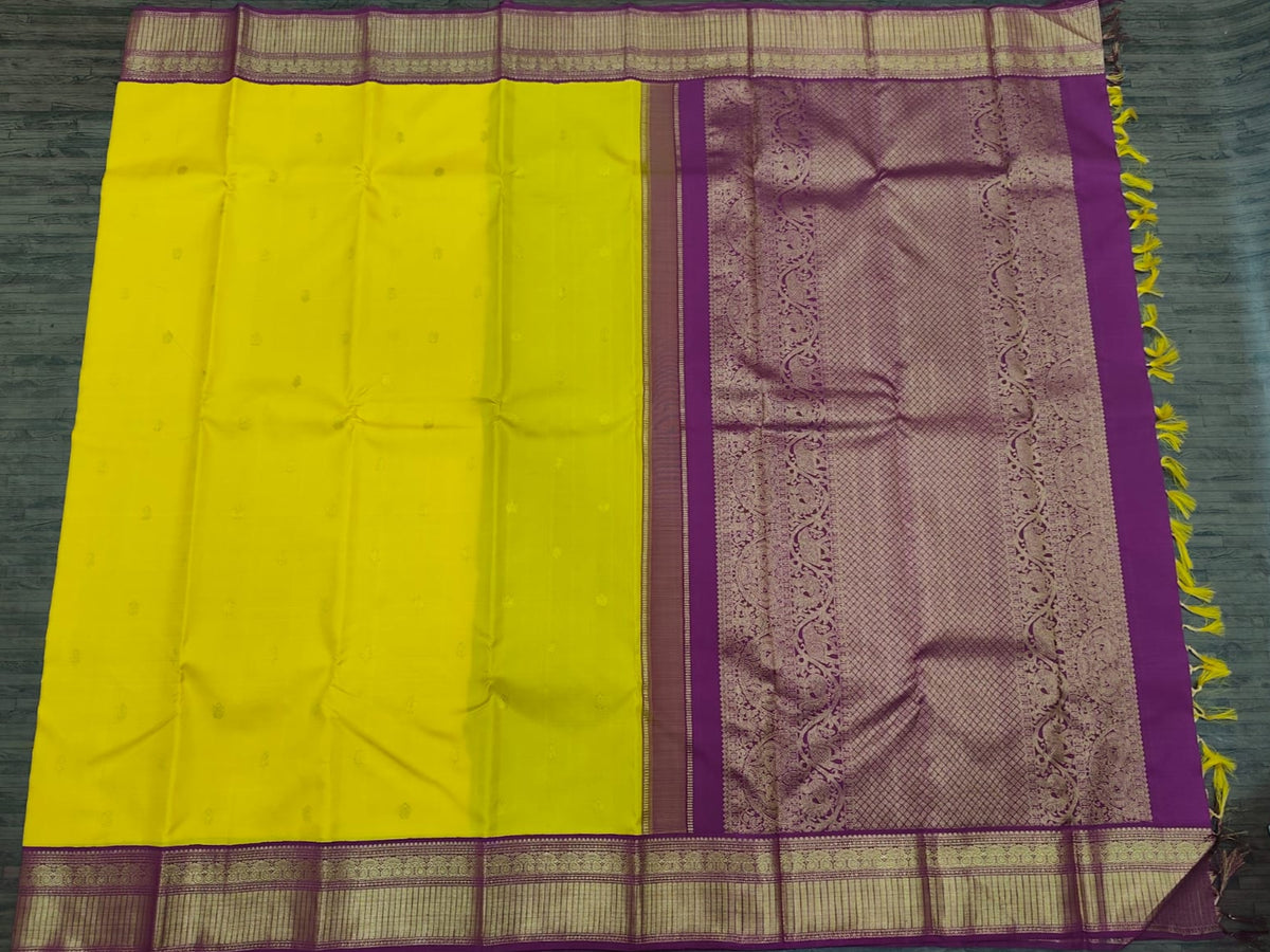 Bright Yellow Kanjivaram Saree with Wine Border