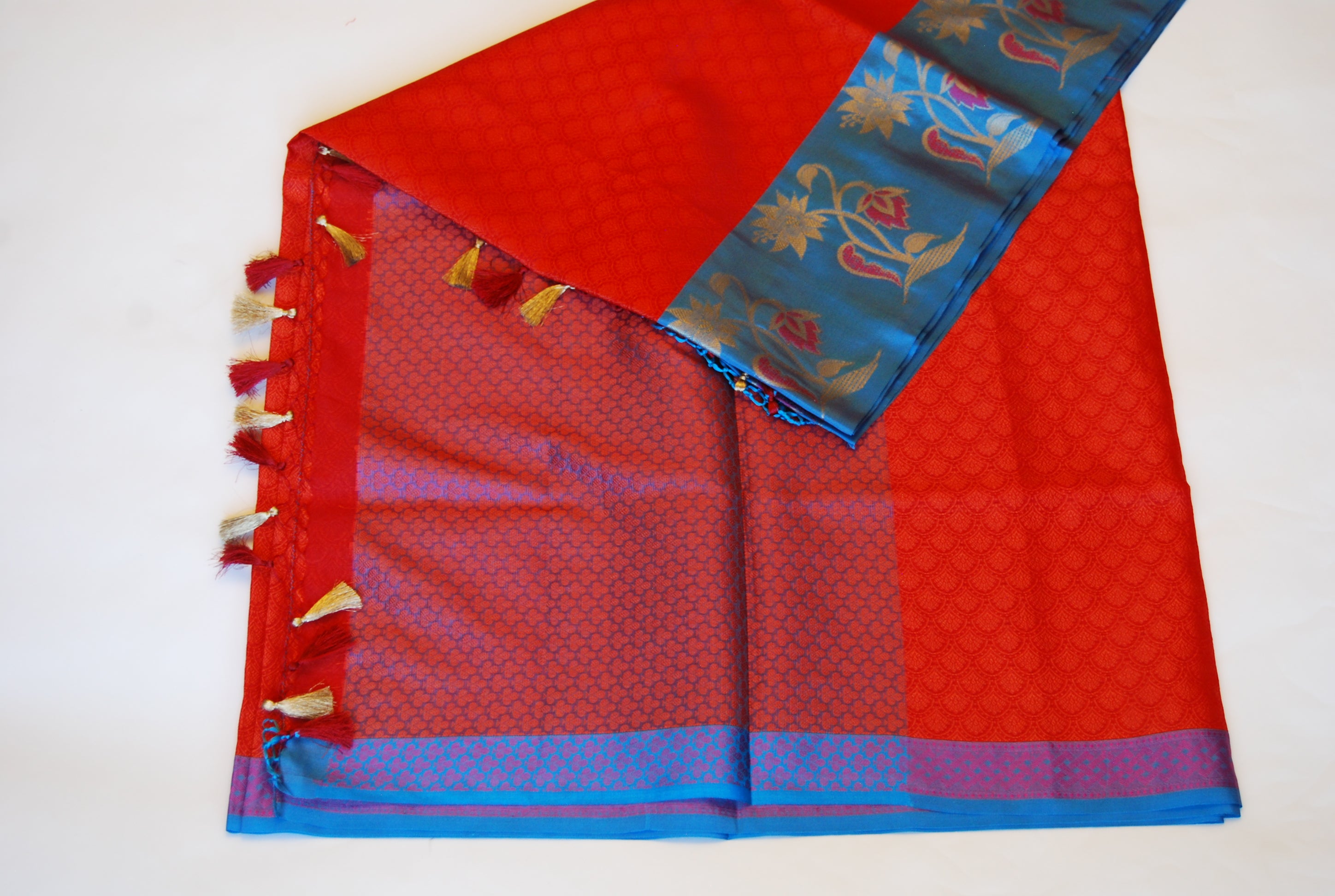 Rust Orange Banarasi Semi Silk Saree with Midnight Blue Border