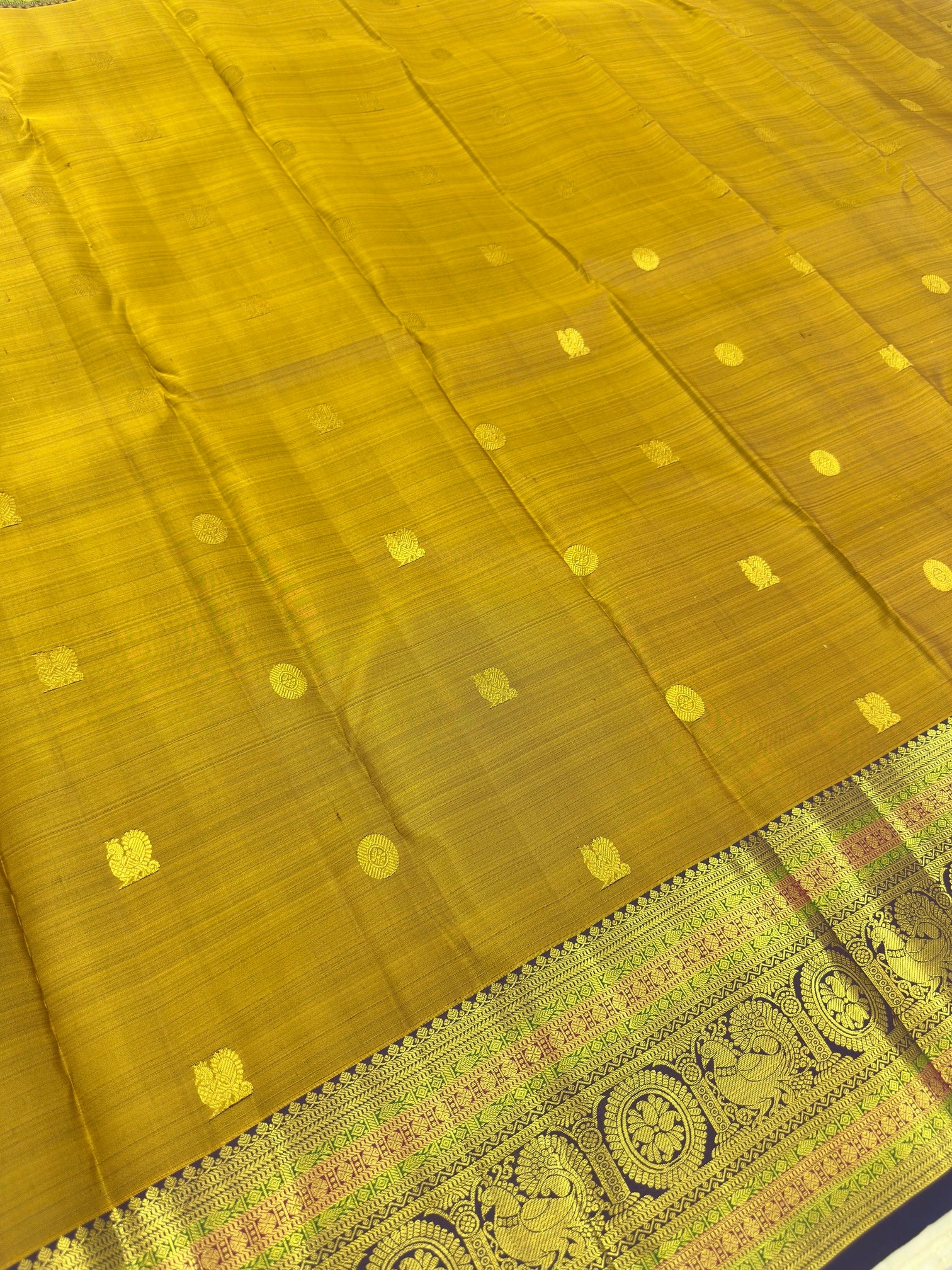 Mustard Kanjivaram Saree with Dark Violet Pallu & Peacock Border