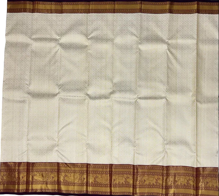 Off White Kanjivaram Saree with Maroon Border