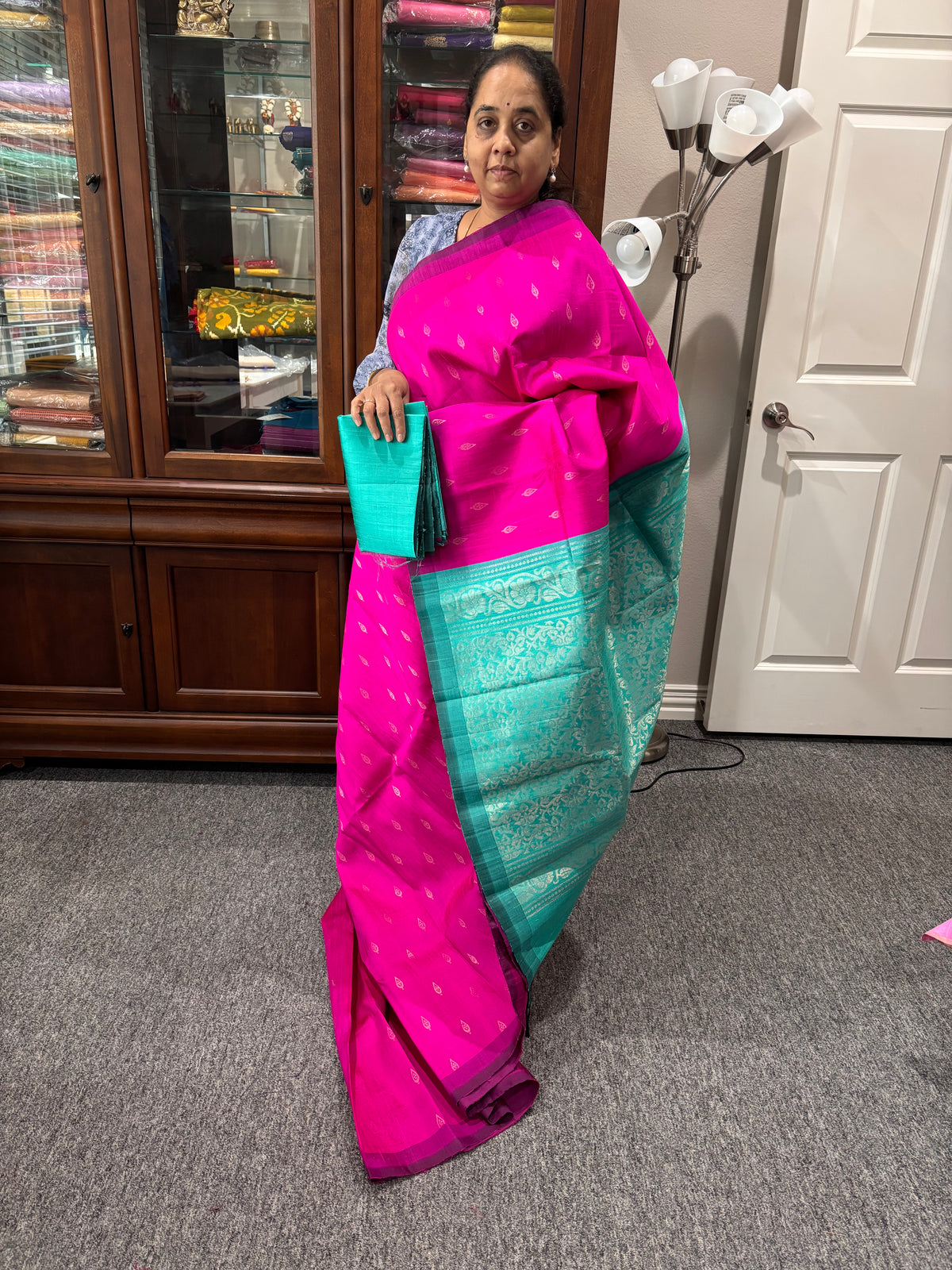 Pink color raw silk saree with Teal pallu