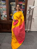 Yellow color raw silk saree with Peach color pallu