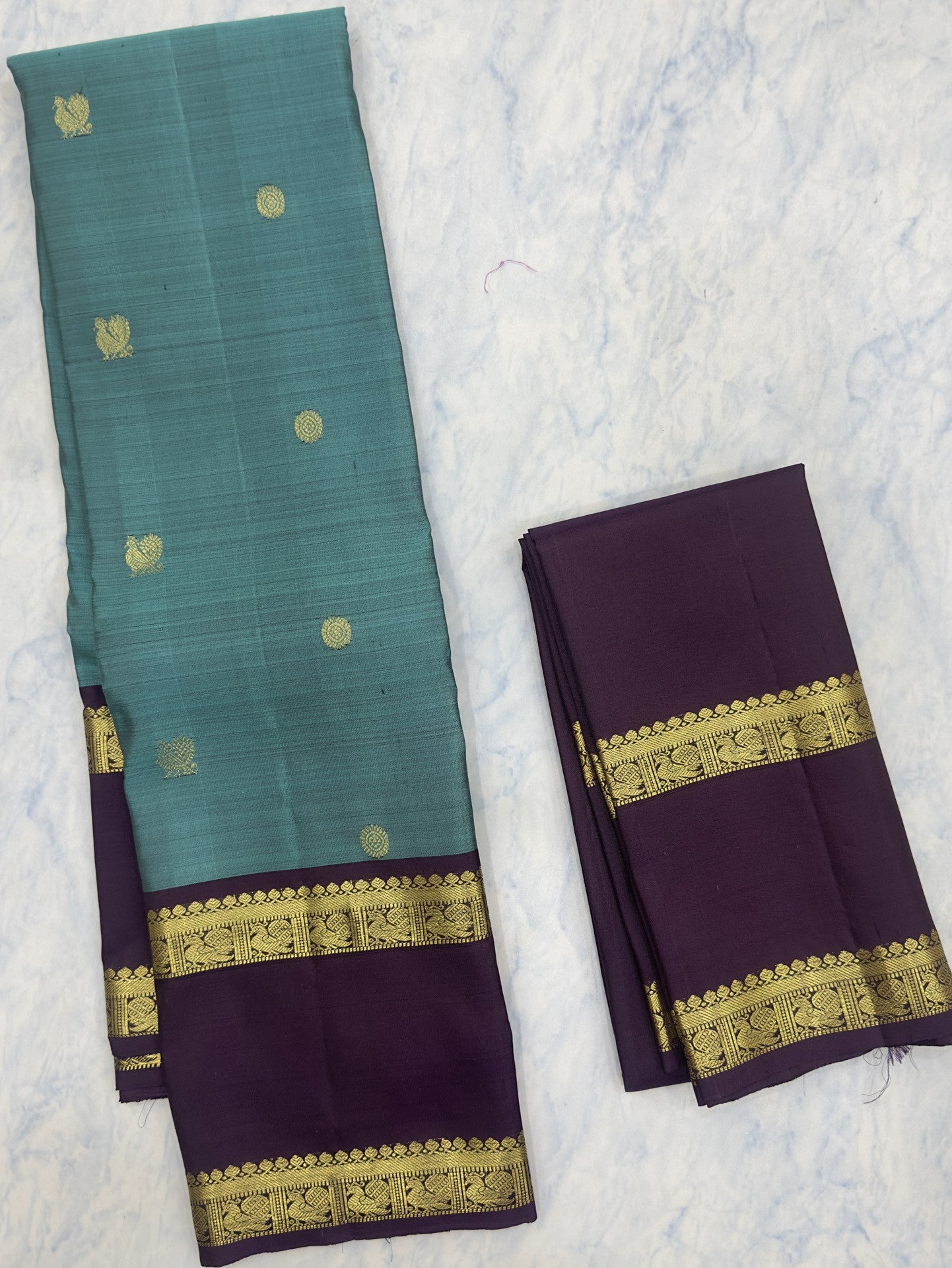 Peacock Blue Kanjivaram Saree with Deep Wine Grape Border