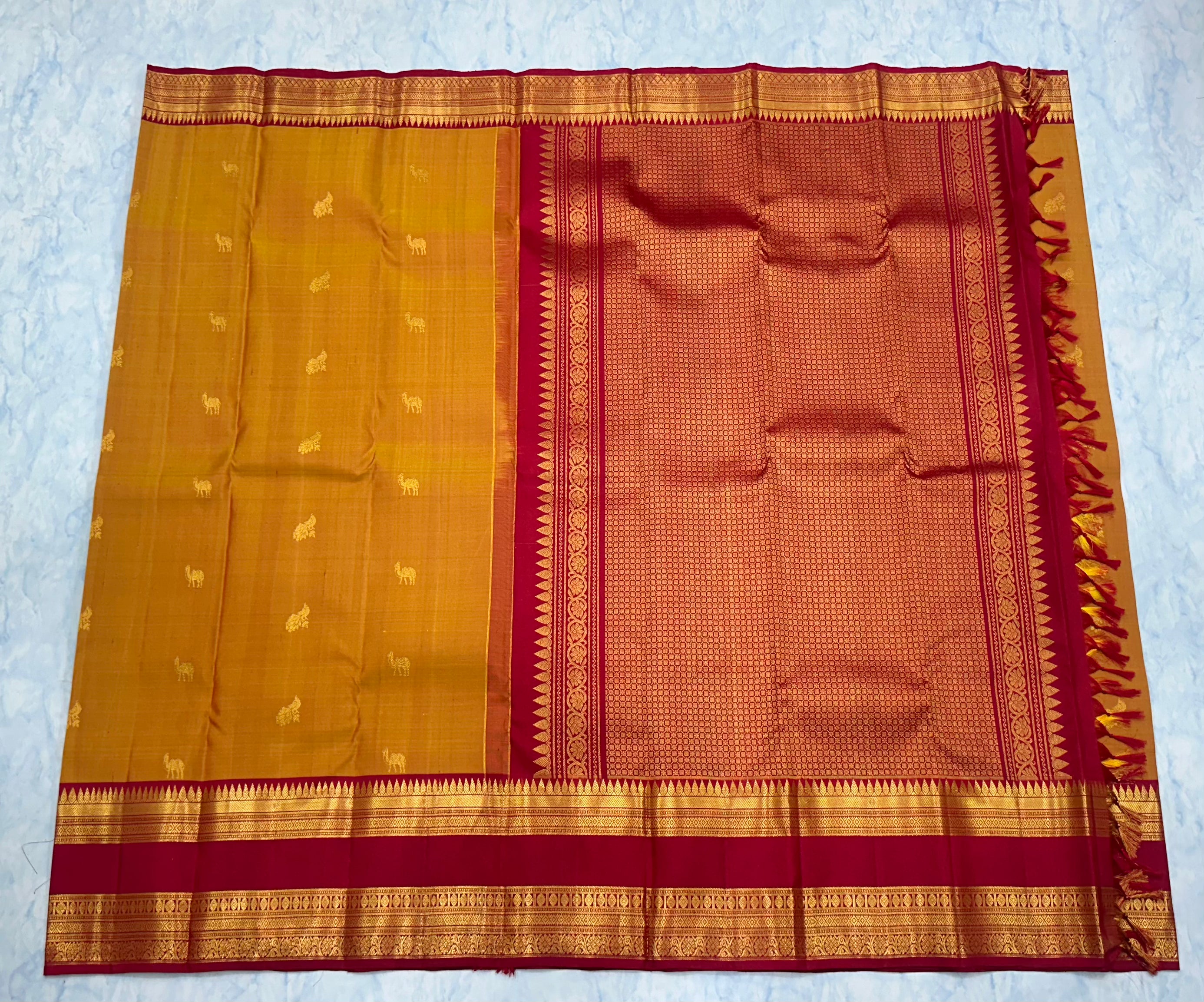 Mustard Orange Kanjivaram Saree with Deep Maroon and Golden Zari Border