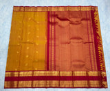 Mustard Orange Kanjivaram Saree with Deep Maroon and Golden Zari Border