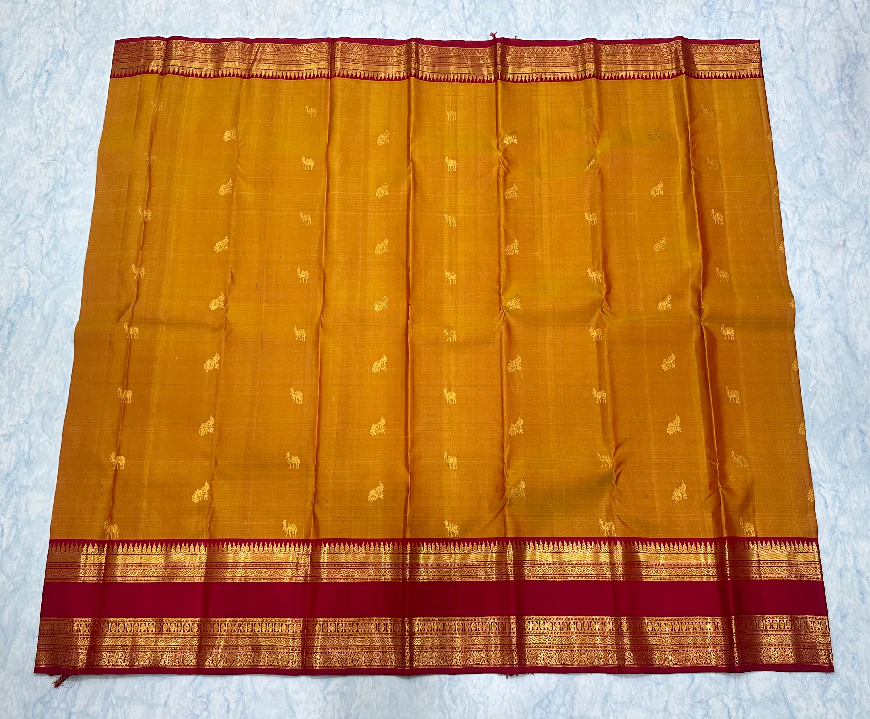 Mustard Orange Kanjivaram Saree with Deep Maroon and Golden Zari Border