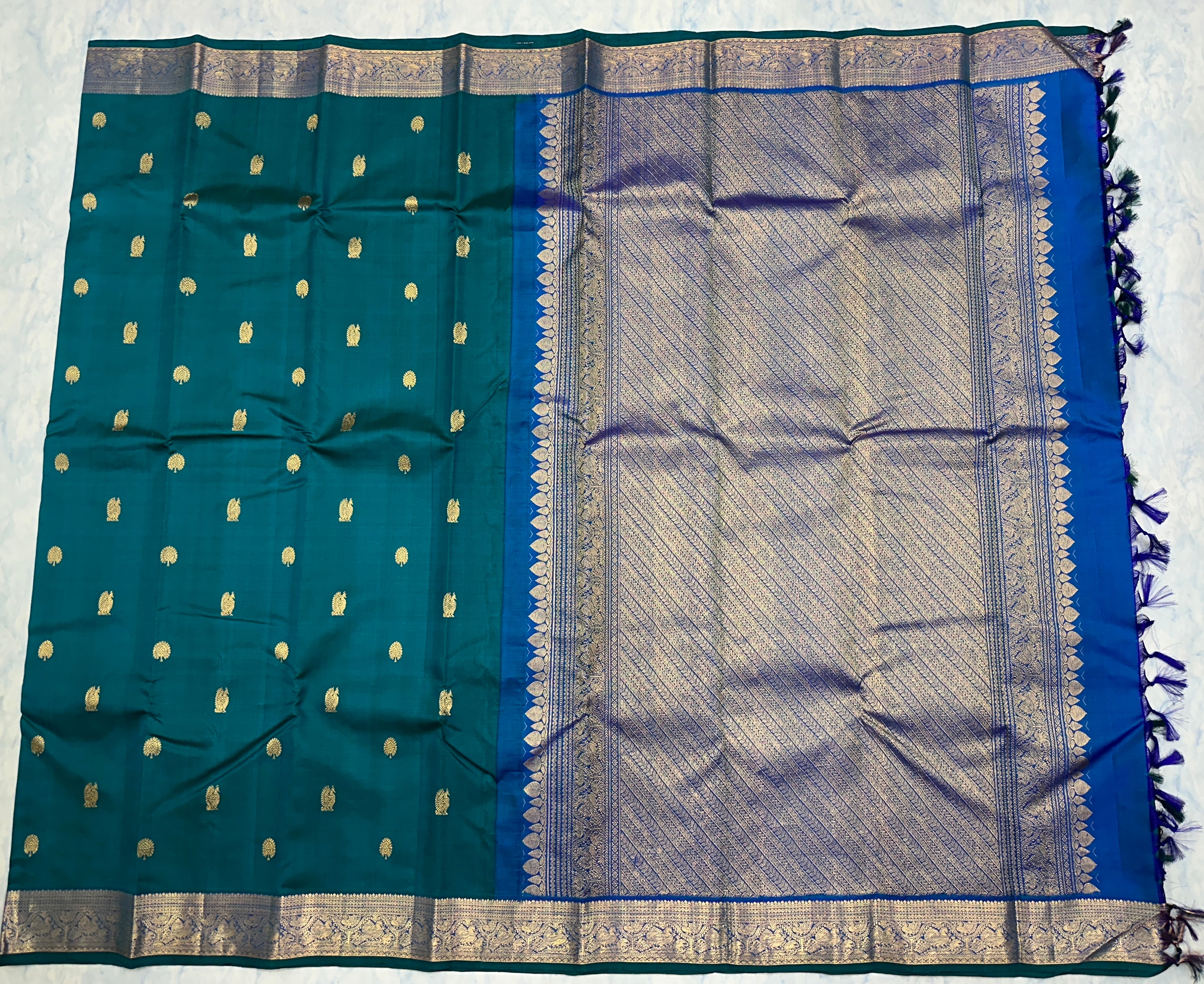 Peacock teal and Royal Blue Kanjivaram Saree with  Antique gold Zari Border