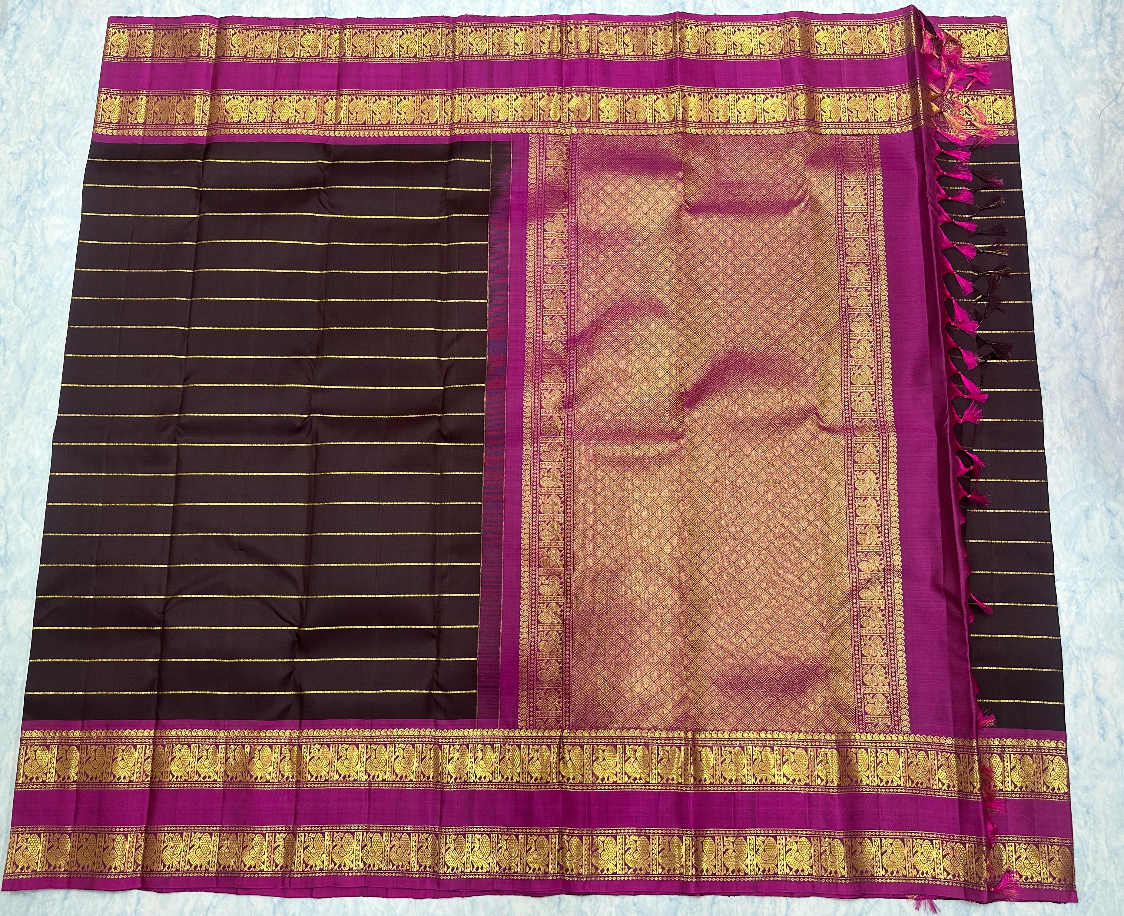 Dark Maroon Kanjivaram Saree with  Rani Pink and gold Zari Border