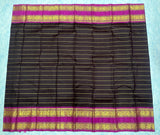 Dark Maroon Kanjivaram Saree with  Rani Pink and gold Zari Border