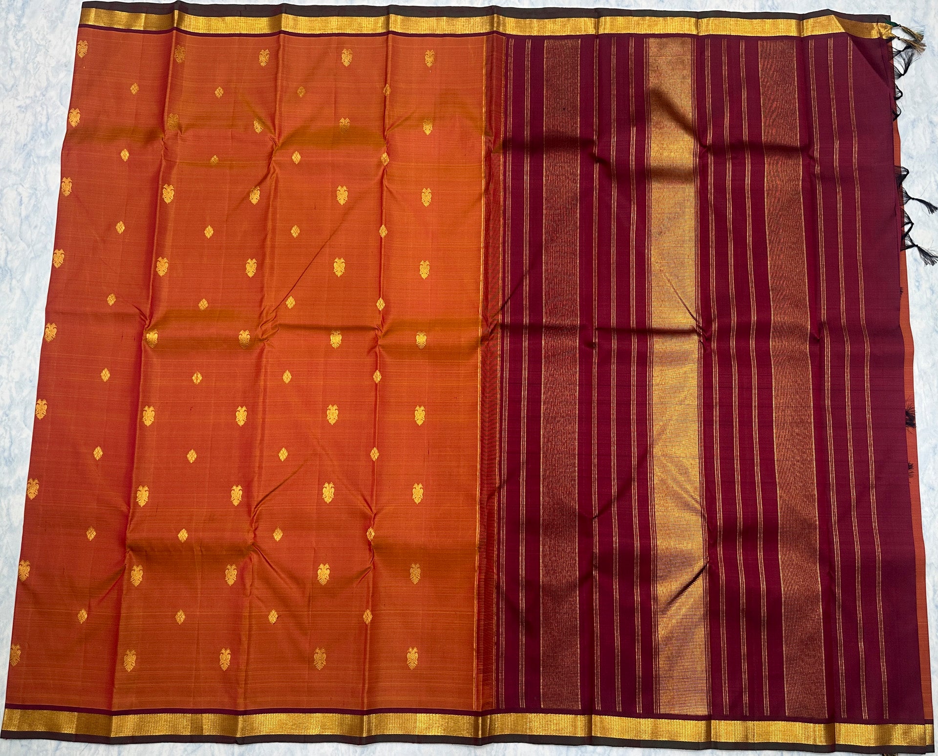 Rust Orange Kanjivaram Saree with Maroon Border