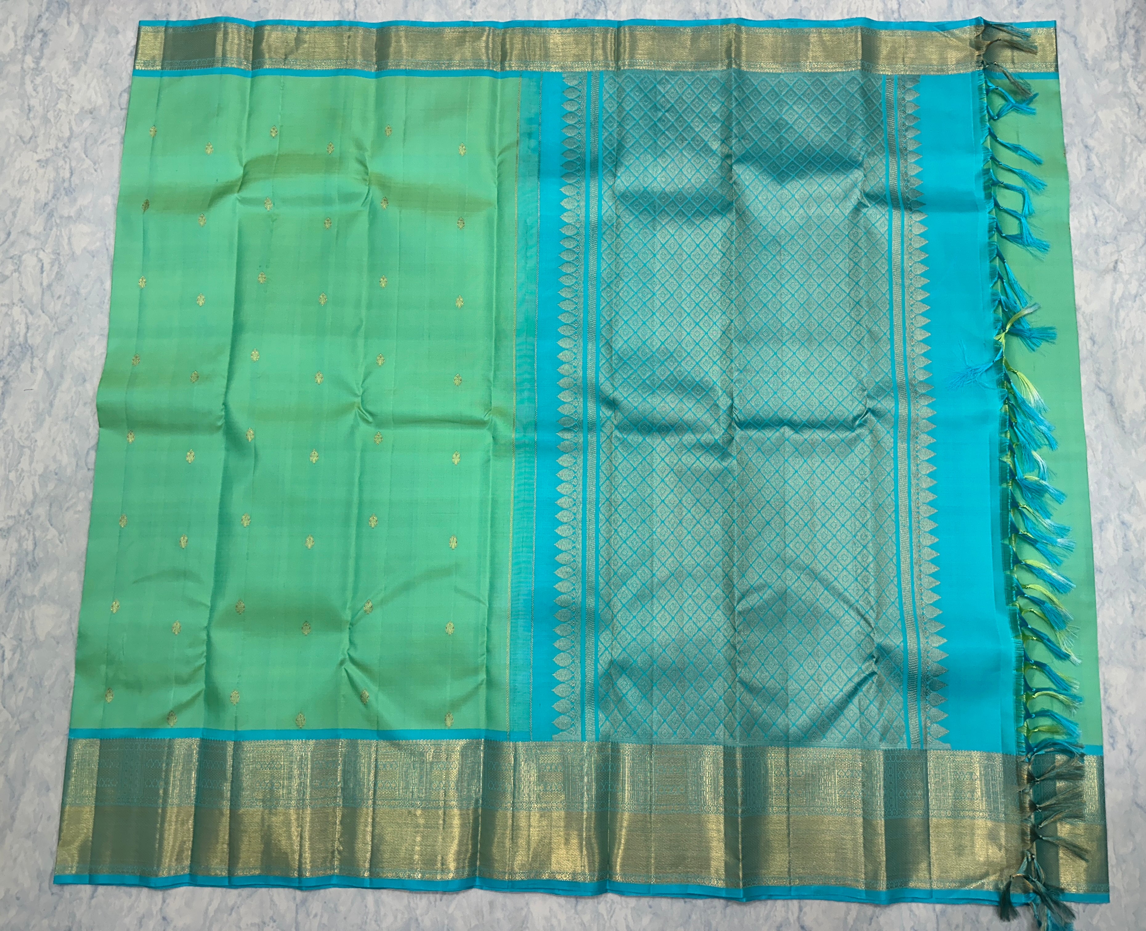 Mint Green Kanjivaram Saree with Golden Zari Border
