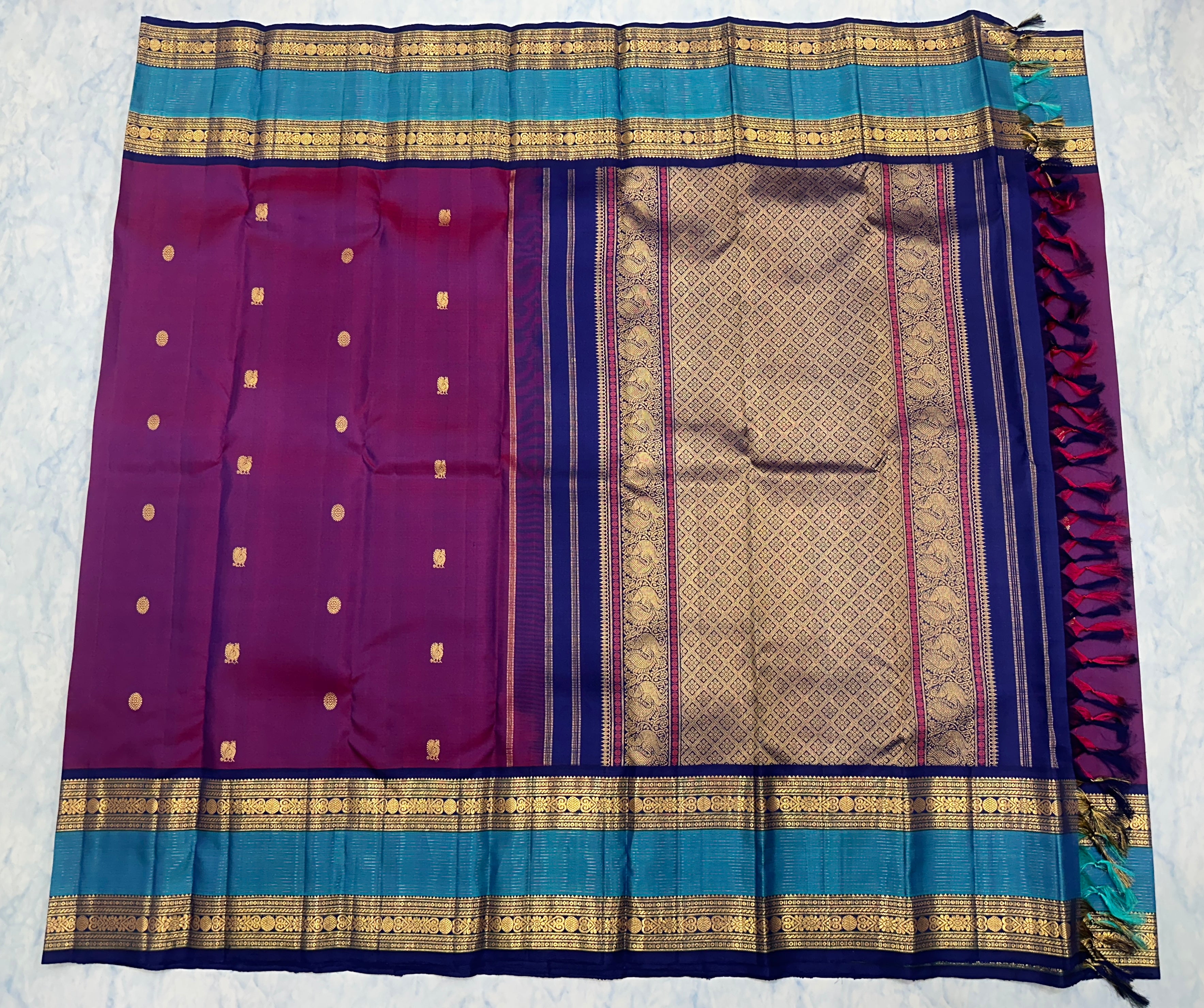 Purple Kanjivaram Saree with Royal Blue and golden Zari Border