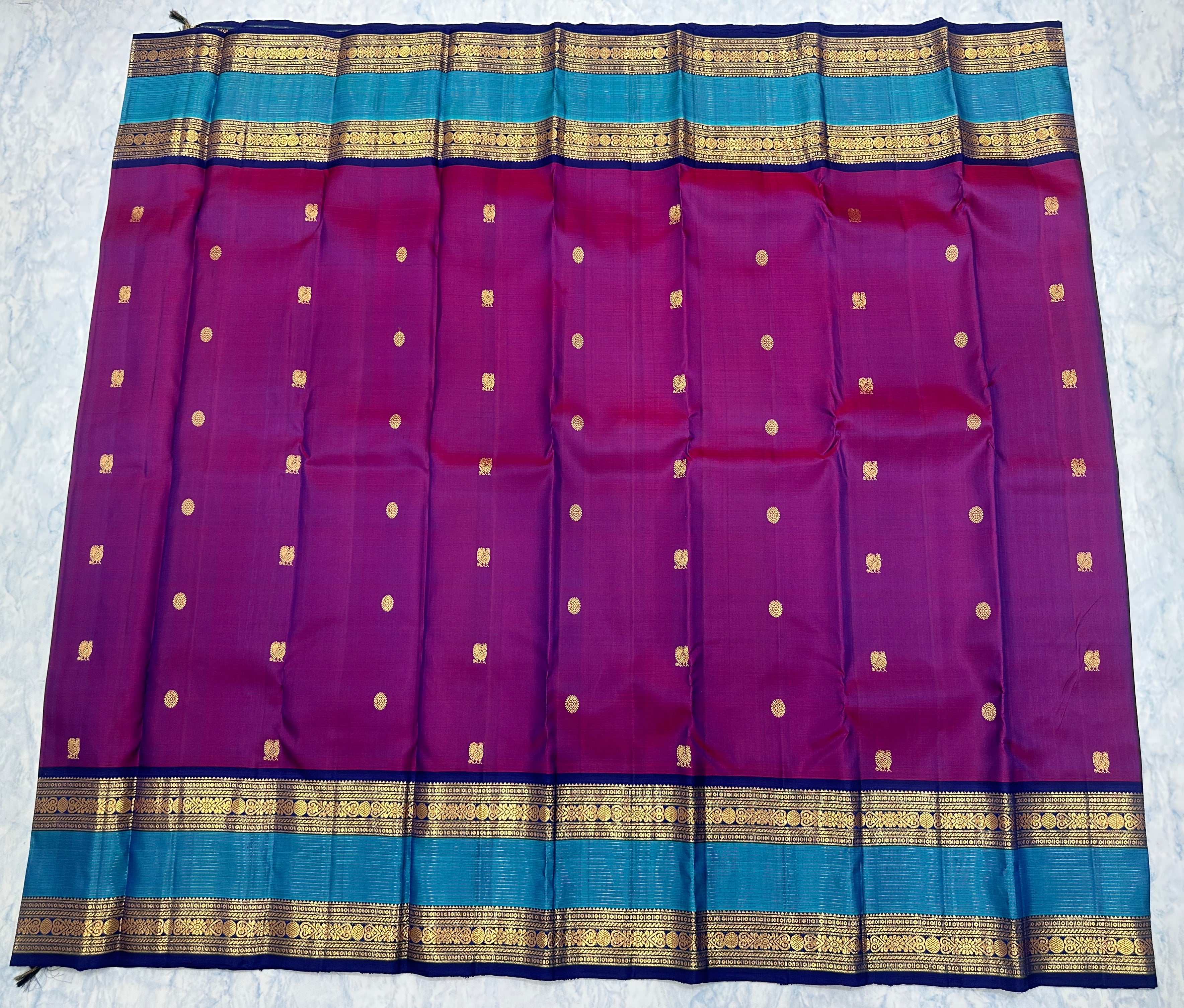 Purple Kanjivaram Saree with Royal Blue and golden Zari Border