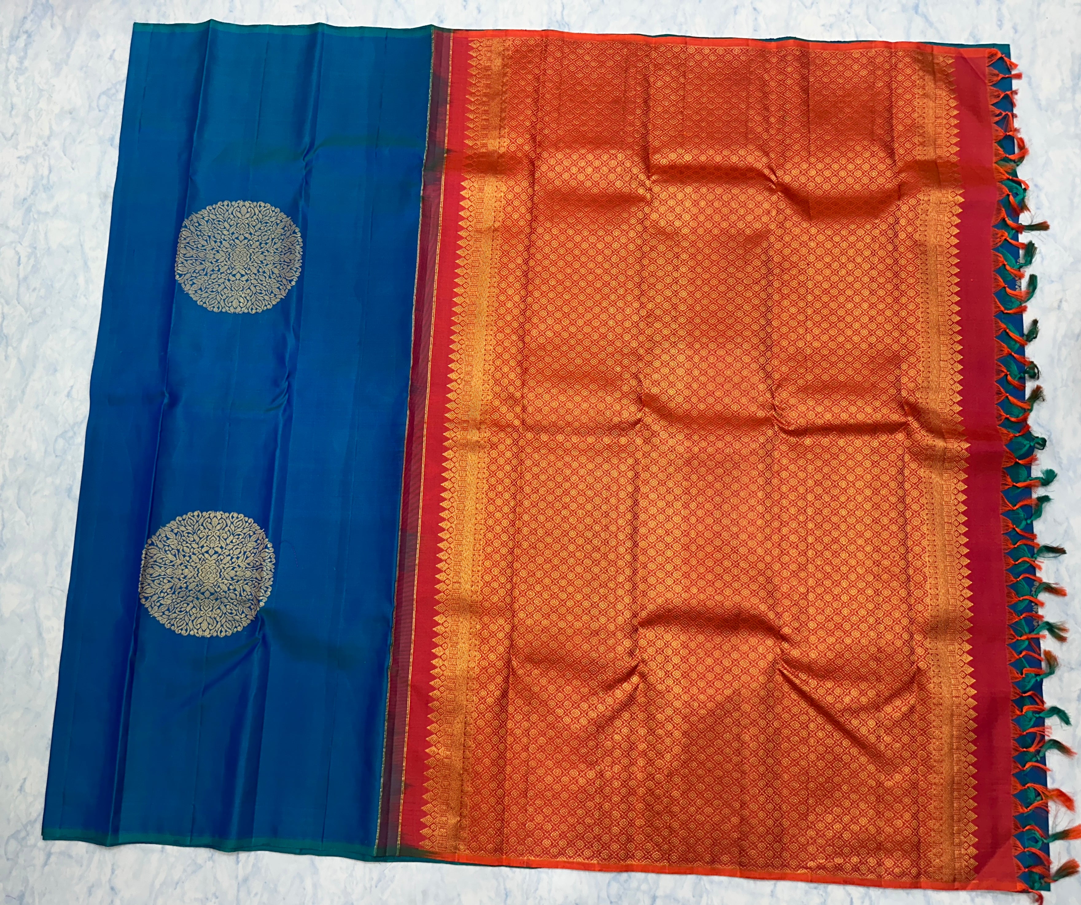Peacock Blue Kanjivaram Saree with Orange Pallu