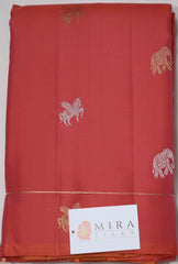 Peach borderless Kanjivaram Saree with unique motifs