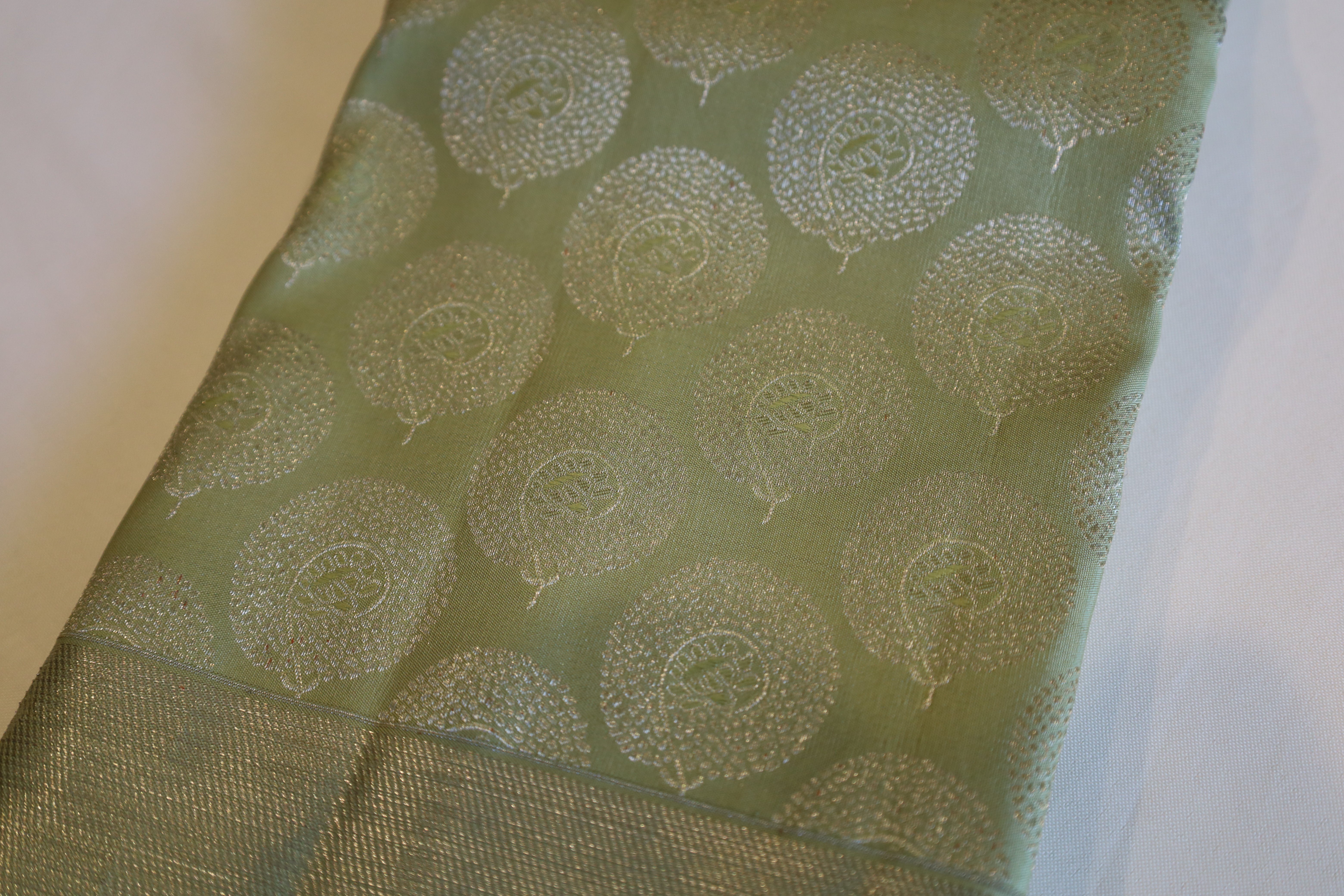 Pistachio Green Kanjivaram Saree with Silver Zari Border