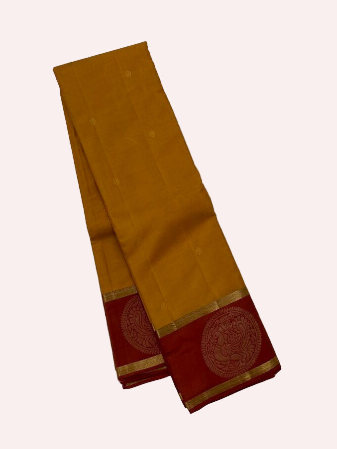 Ochre Kanjivaram Saree with Peacock Border and Red Pallu