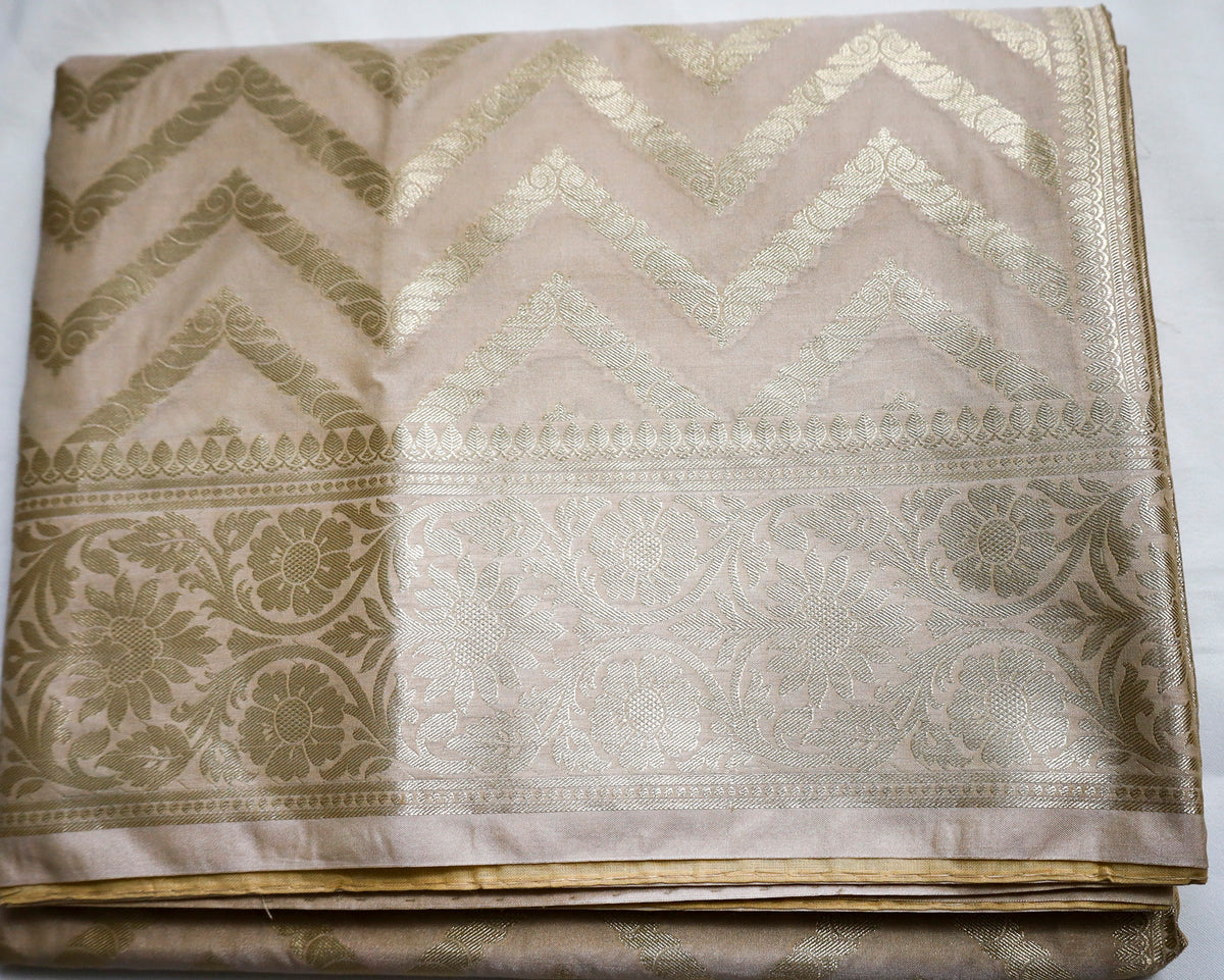 Beige Semi Banaras saree with silver design border