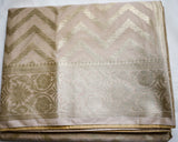 Beige Semi Banaras saree with silver design border