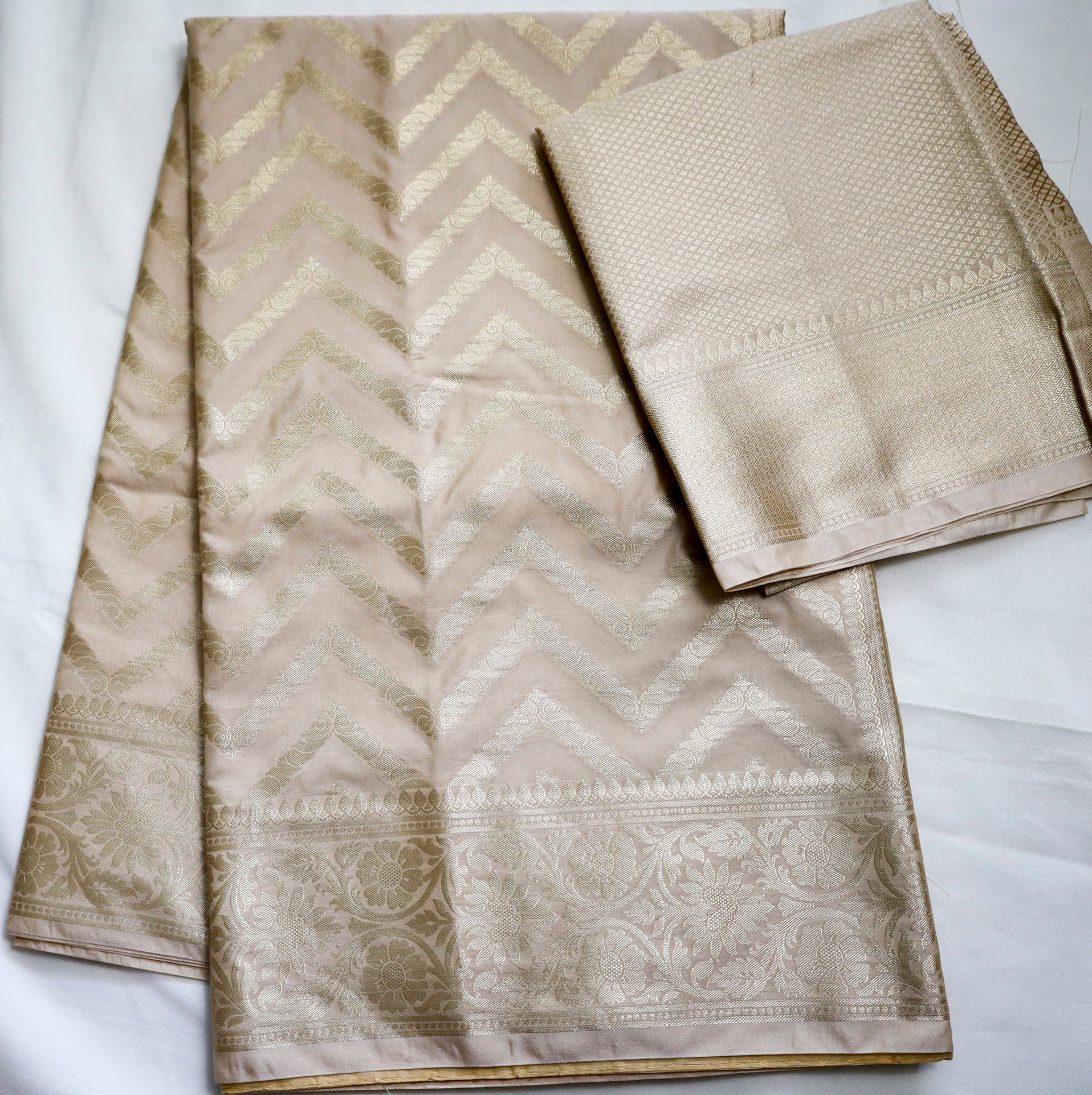 Beige Semi Banaras saree with silver design border