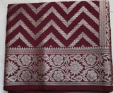 Maroon Semi Banaras saree with silver design border