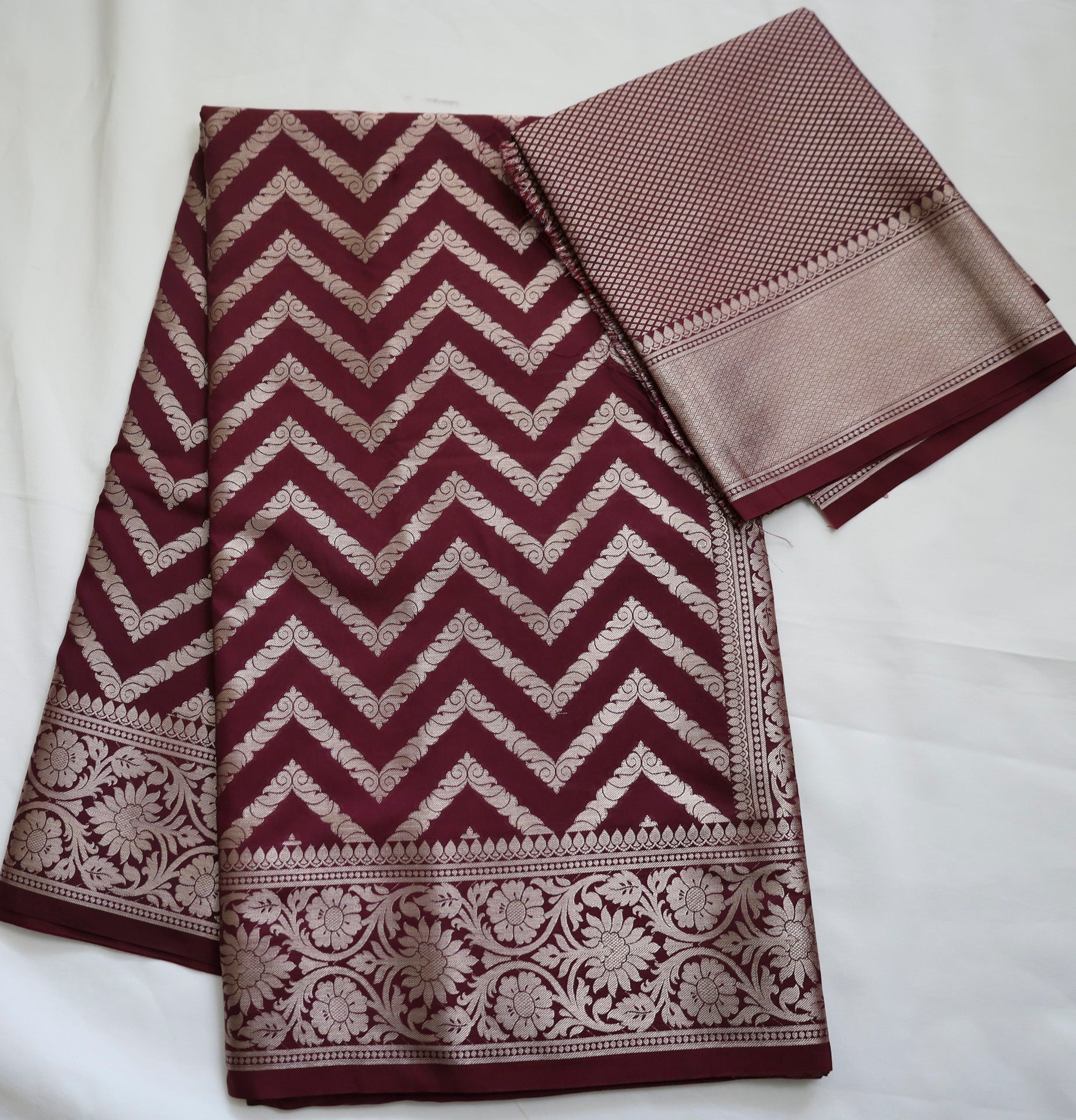 Maroon Semi Banaras saree with silver design border